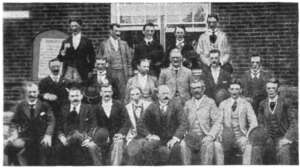 A picture of 19 individuals partaking in NCR's 1894 new hire sales training, where they would learn the sales methodology found in the NCR Primer.
